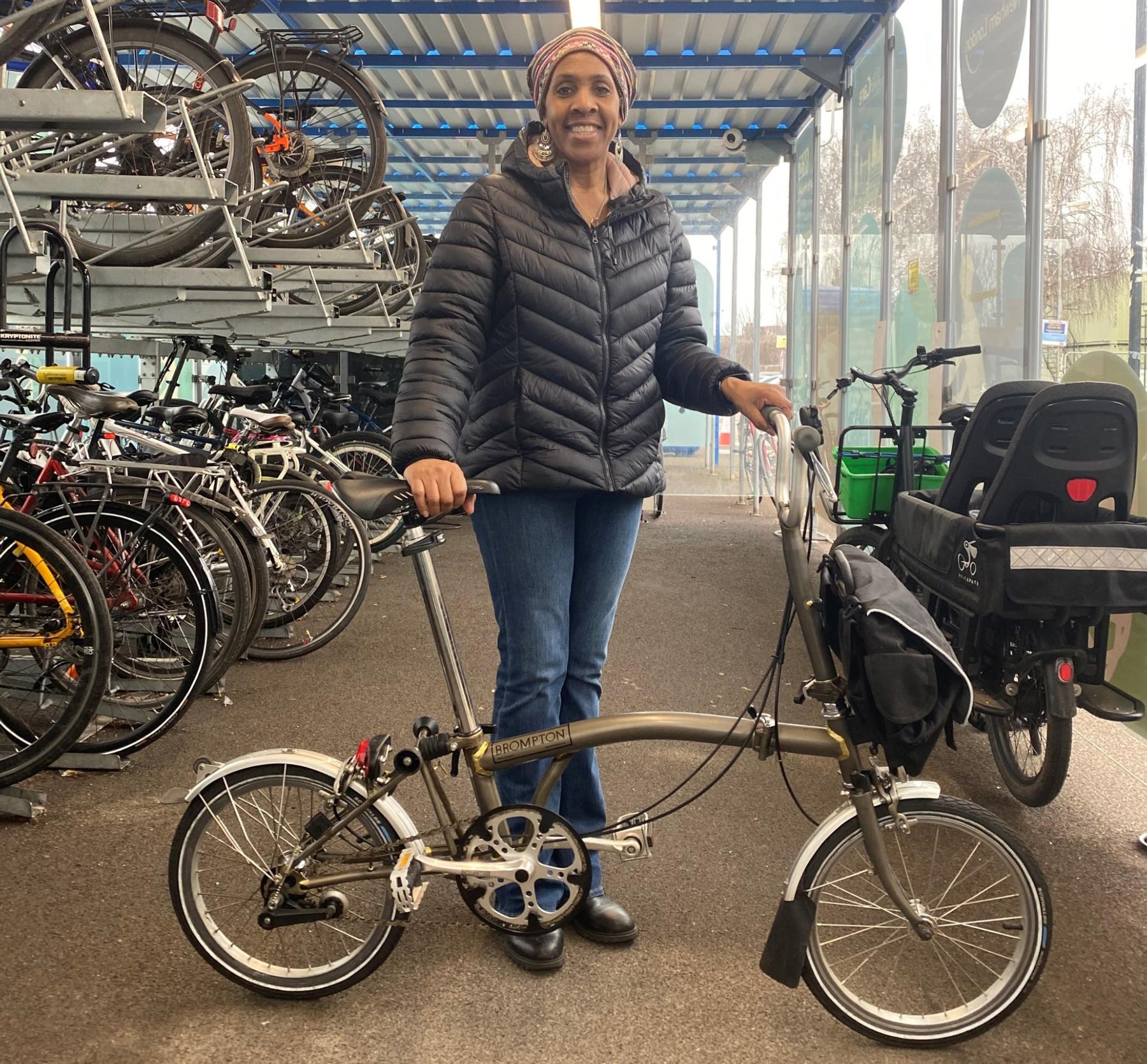 Sharron Campbell with her donated Brompton Bike