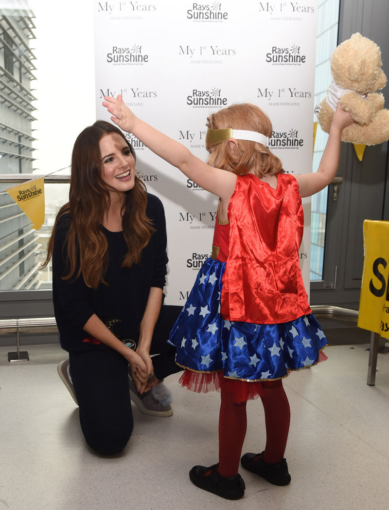 Binky Felstead is pictured with a young patient dressed as a superhero. Pictured at the Activity Day on the 26 October 2017. 